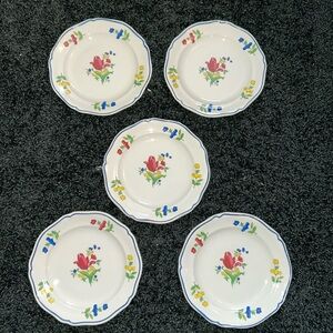 Faience bon vivant tulip plates.
